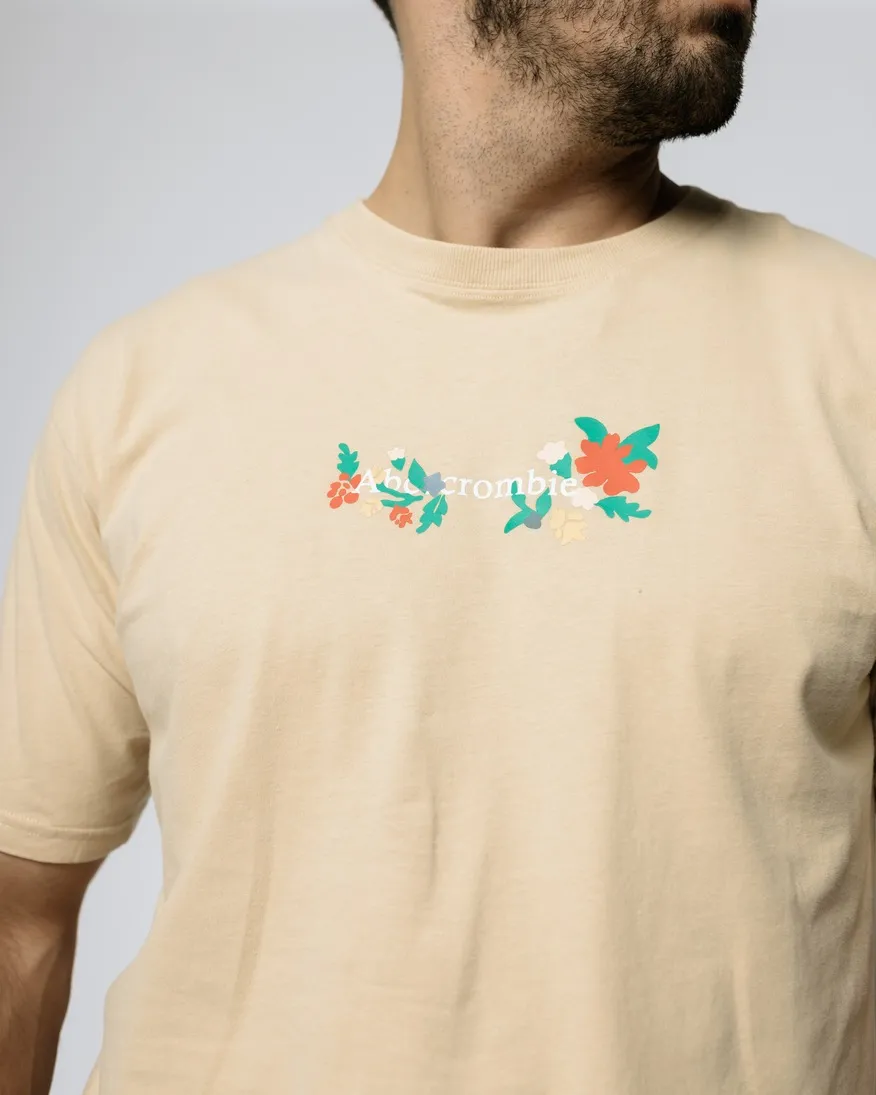 REMERA ABERCROMBIE OVERSIZE FLOWERS BEIGE