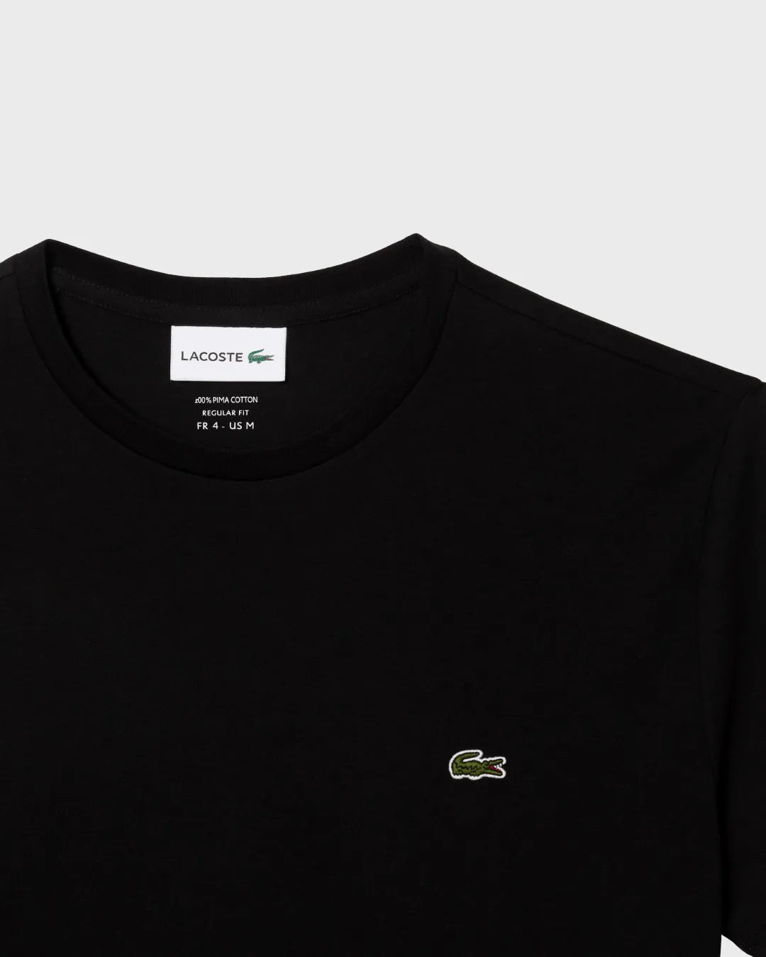 REMERA CUELLO REDONDO LACOSTE NEGRA