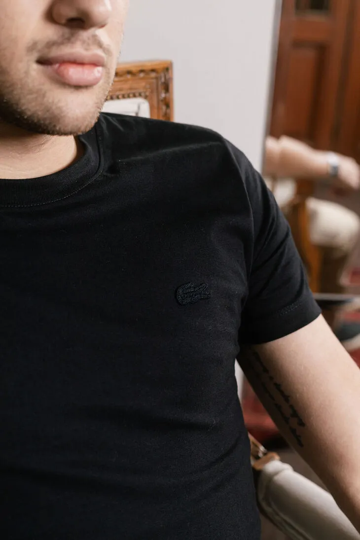 REMERA LACOSTE CUELLO REDONDO PARIS NEGRA