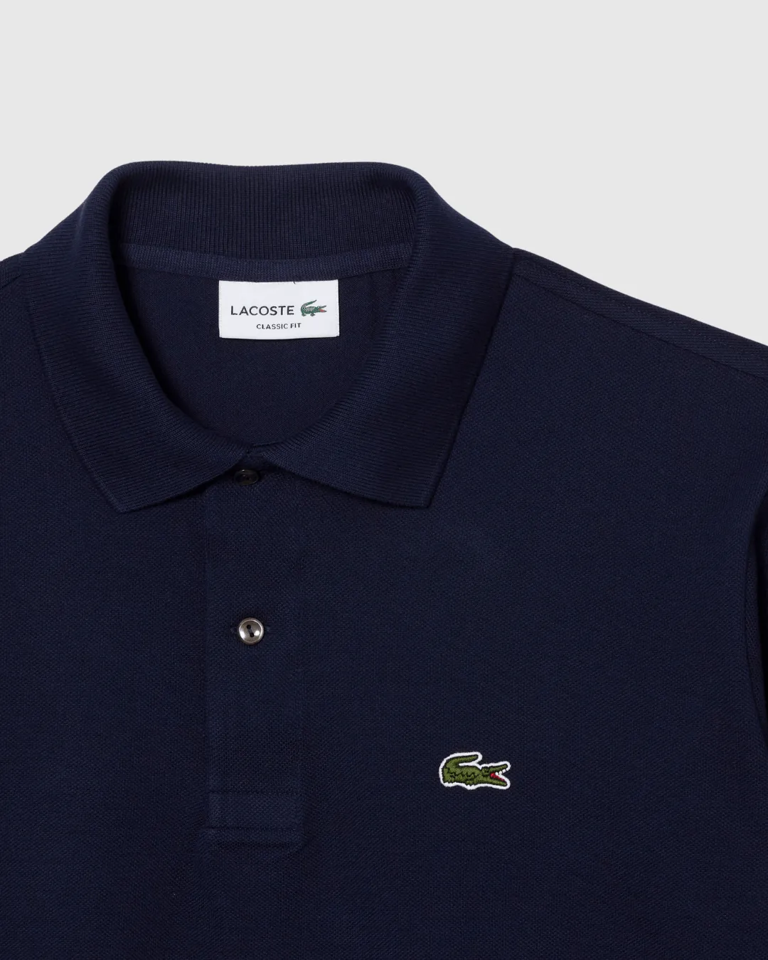 REMERA CUELLO POLO LACOSTE AZUL MARINO