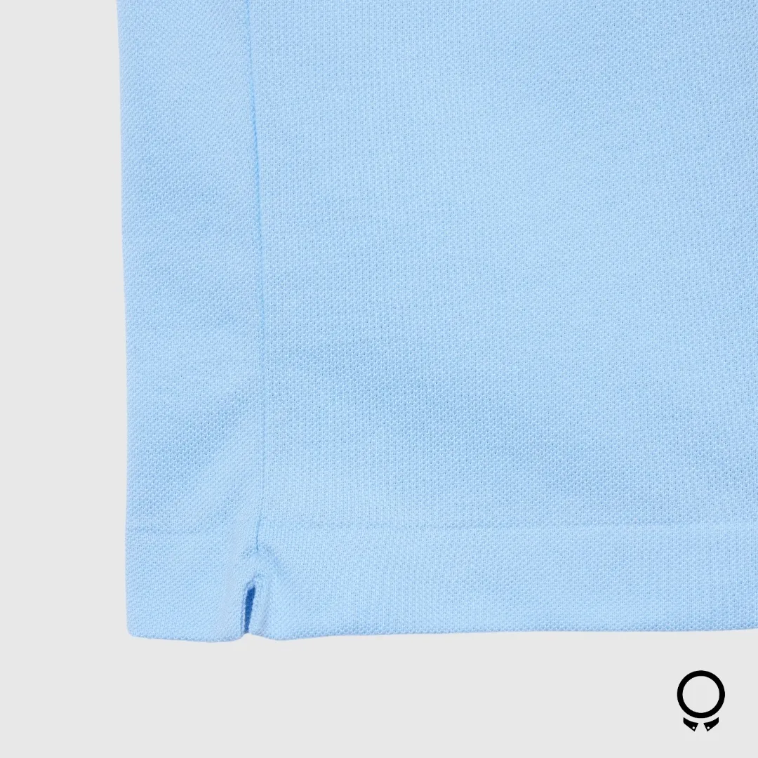 REMERA POLO LACOSTE CELESTE