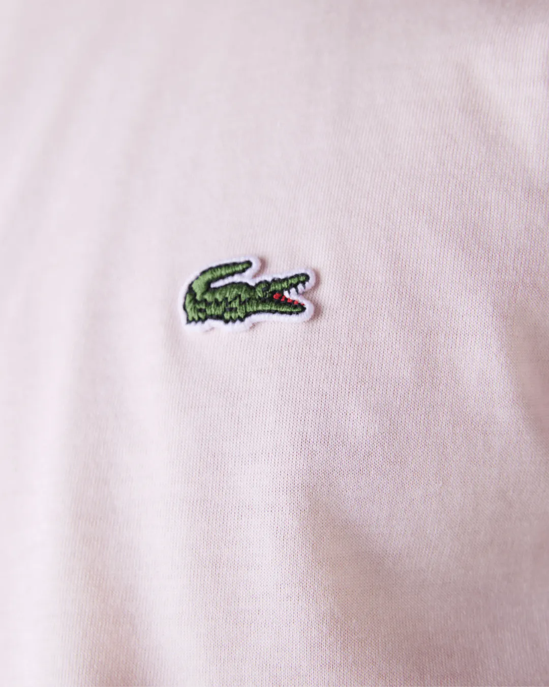 REMERA CUELLO REDONDO LACOSTE ROSADA