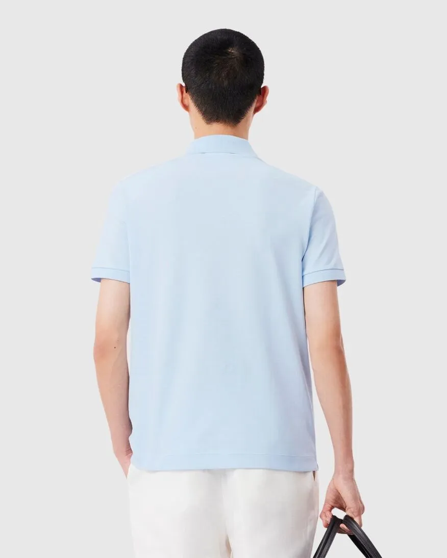 REMERA LACOSTE POLO PARIS CELESTE