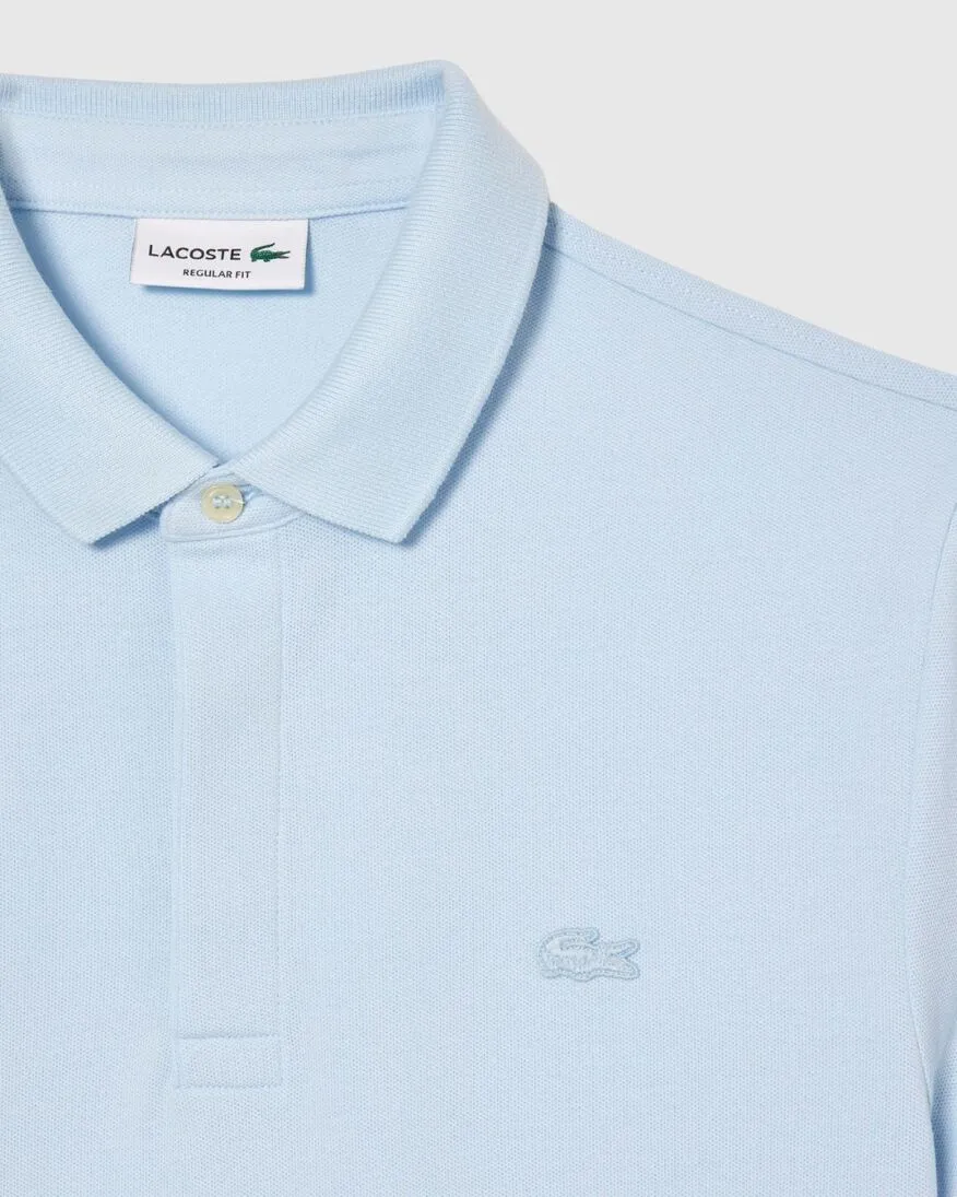 REMERA LACOSTE POLO PARIS CELESTE