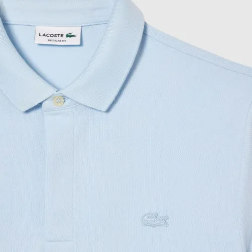 REMERA LACOSTE POLO PARIS CELESTE